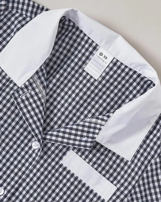 Cibler la robe de l'école Gingham