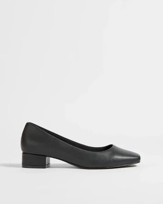 Cible femme en cuir bas talon de robe de bloc