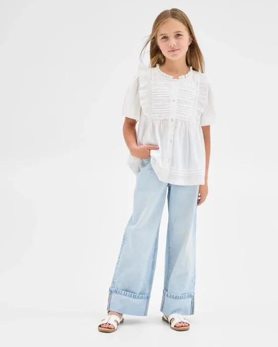 Jeans denim à la jambe à la poitrine