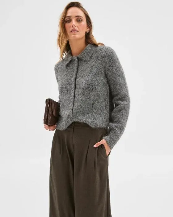 Aperçu Bouton en peluche à travers un Cardigan collaté