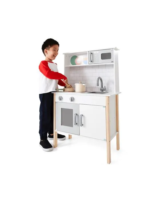 Cuisine en bois avec poêle à son et lumière